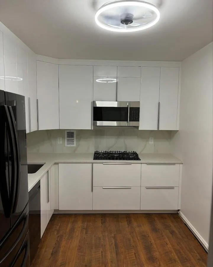Renovated kitchen with quartz countertops in Milford